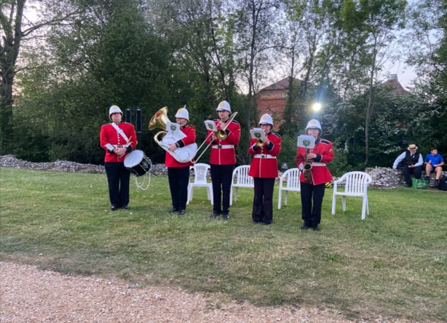 A brass band plays at VE Day 80 celebrations in Bishops Waltham