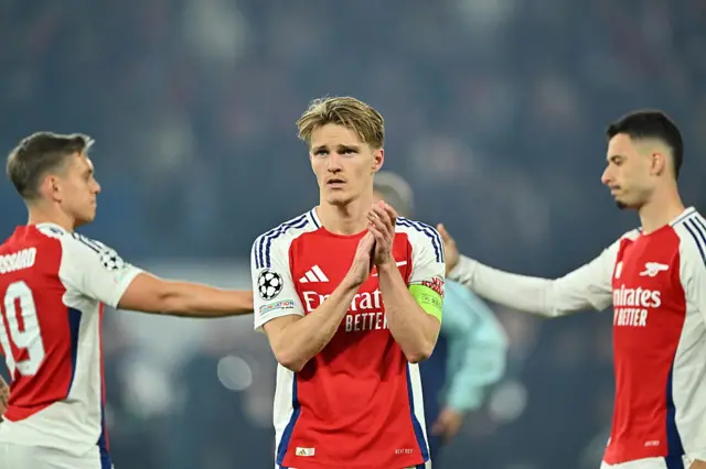 Arsenal players after defeat