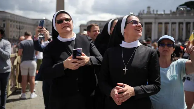Two nuns in habits smiling