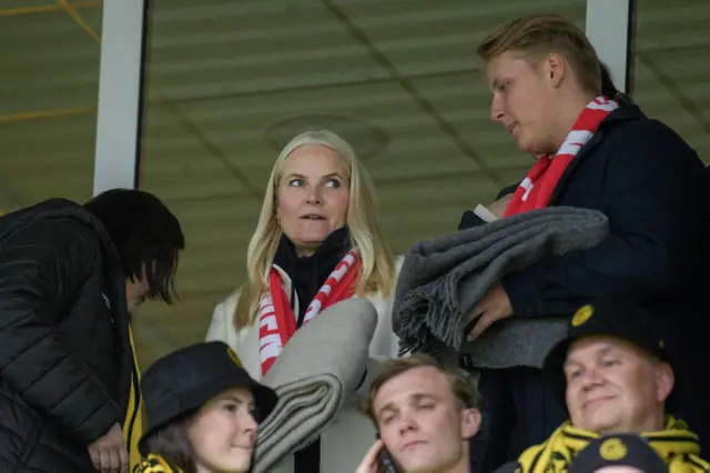 Norway's Crown Princess Mette-Marit (C) and Prince Sverre Magnus (R) watch the UEFA Europa League semi-finals 2nd leg soccer match beyween Bodo/Glimt and Tottenham Hotspur,
