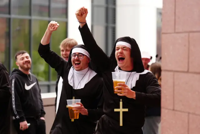 Darts fans dressed as nuns
