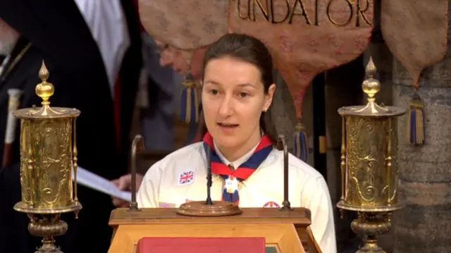 Abigail McFarlane in King's Scout white shirt with blue and red scarf tied around her neck