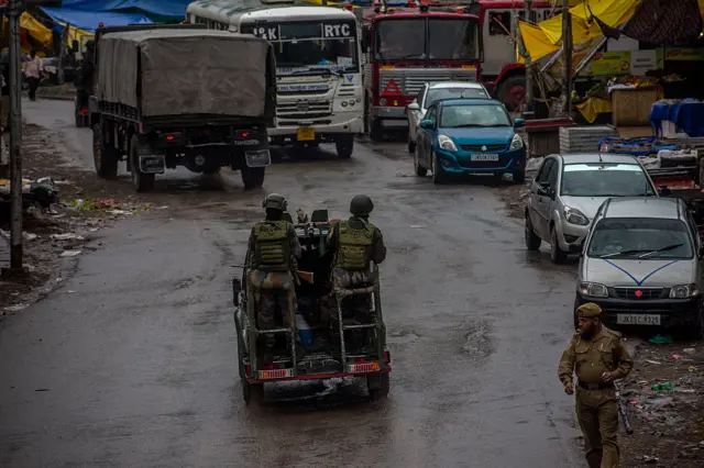 An Indian Army convoy carrying reinforcements and supplies drives