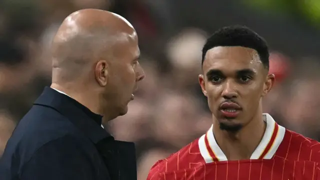 Liverpool manager Arne Slot and Trent Alexander-Arnold