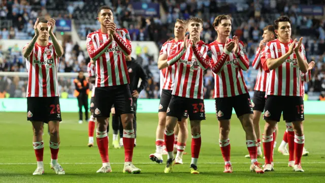 Sunderland players clap