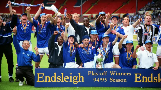 Chesterfield's players celebrating winning the 1995 play-offs at Wembley