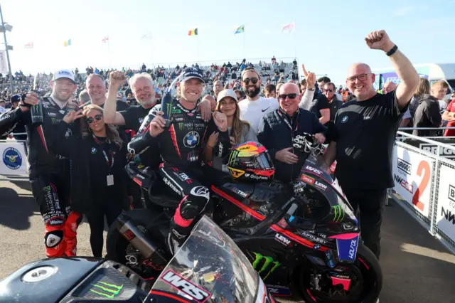 Davey Todd celebrates with his team