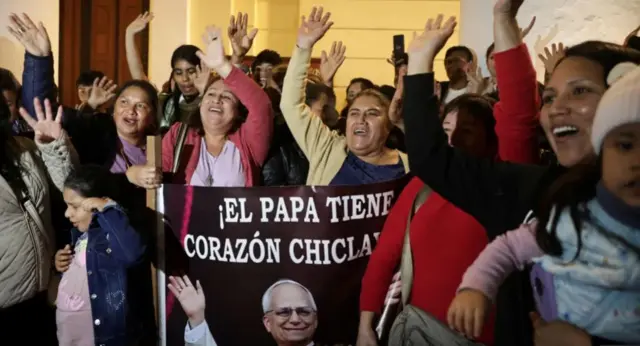Peruvians celebrating the election of Pope Leo XIV