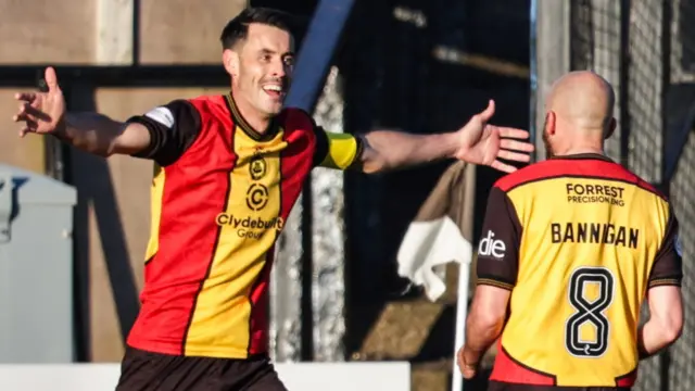 Partick Thistle's Brian Graham celebrates with Stuart Bannigan