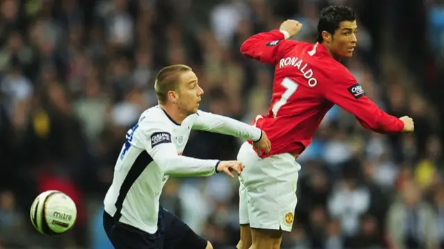 Jamie O'Hara battles with Cristiano Ronaldo