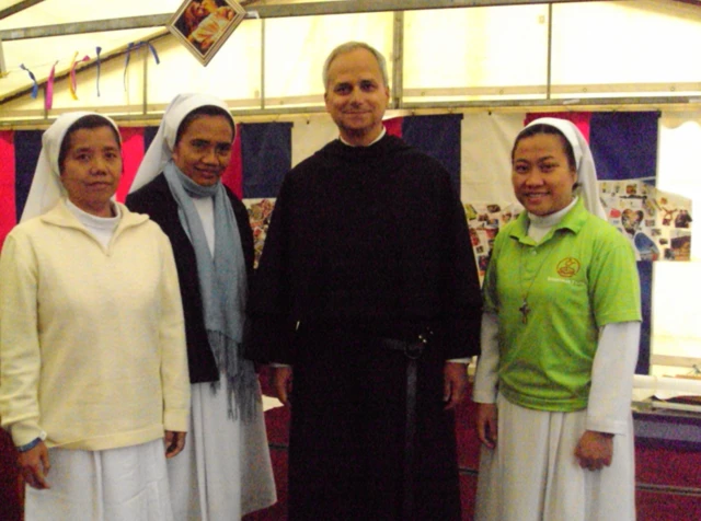 Pope Leo, then Cardinal Robert Prevost, with three nuns in Indonesia