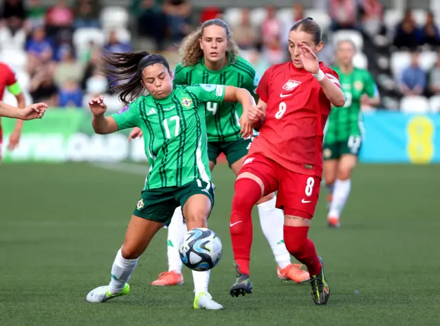 Northern Ireland's Joely Andrews in action against Poland's Ewelina Kamczyk