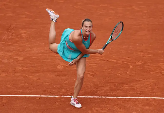 Aryna Sabalenka serves against Amanda Anisimova