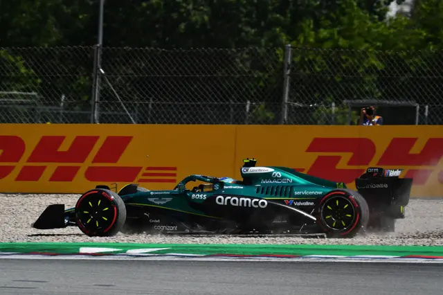 Fernando Alonso drives into gravel