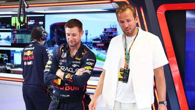 England Captain Harry Kane in the Red Bull garage