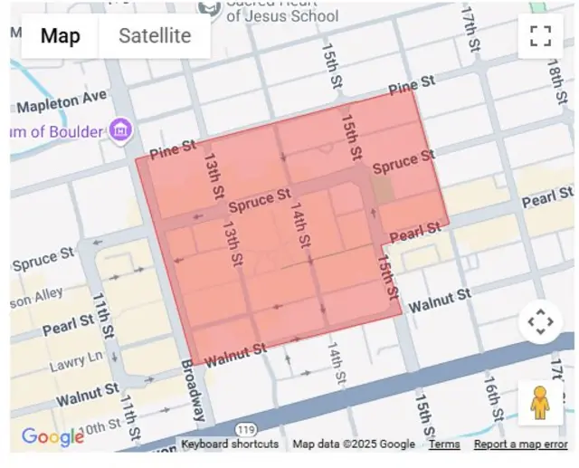A screengrab of Google Maps showing evacuation area shaded in red