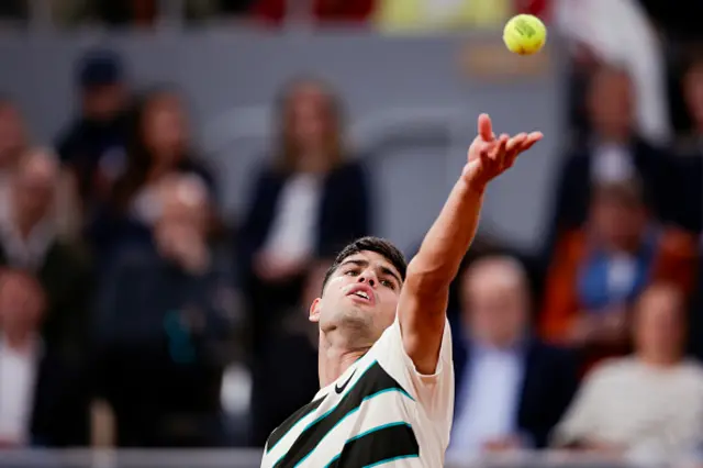 Carlos Alcaraz of Spain serves the ball