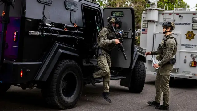 Tactical teams get into position following an incident that the FBI is investigating as an act of terror in Boulder, Colorado on 1 June 2025.