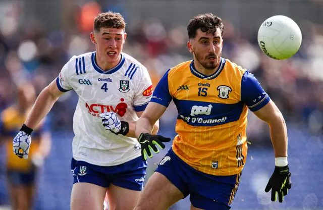 Aaron Griffin of Clare in action against Dylan Byrne of Monaghan