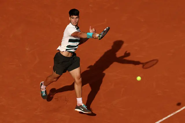 Carlos Alcaraz of Spain plays a forehand