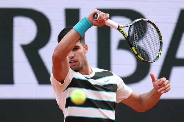 Carlos Alcaraz of Spain plays a forehand