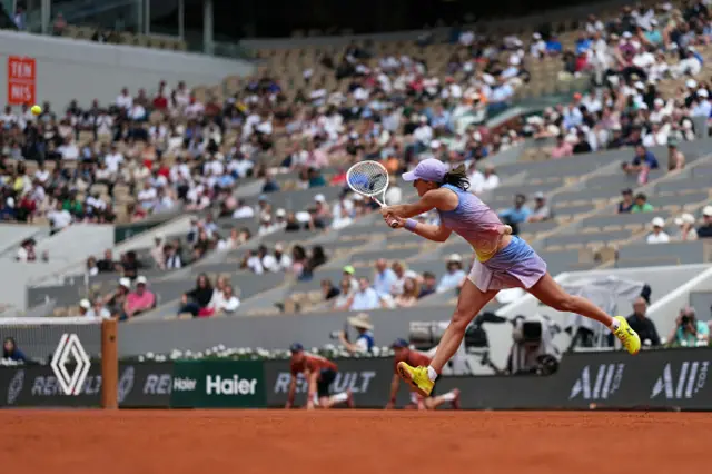 Poland's Iga Swiatek plays a backhand return to Kazakhstan's Elena Rybakina