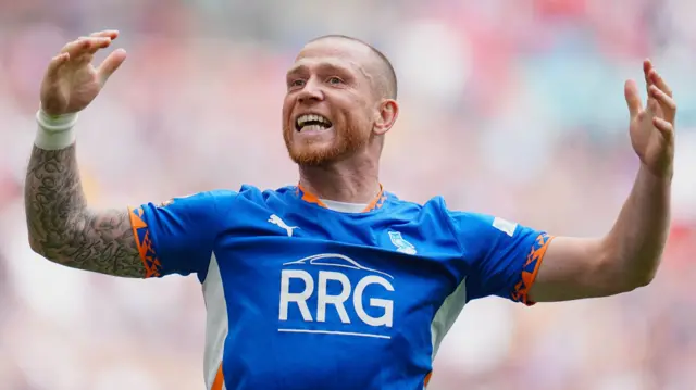 Joe Garner celebrates