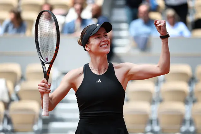 Elina Svitolina of Ukraine celebrates victory over Jasmine Paolini