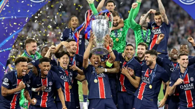 PSG players lift the Champions League trophy after being Inter Milan