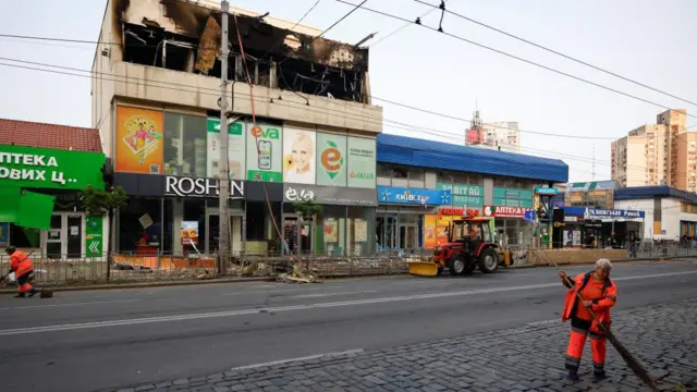 A parade of shops damaged by a Russian air strike in Kyiv