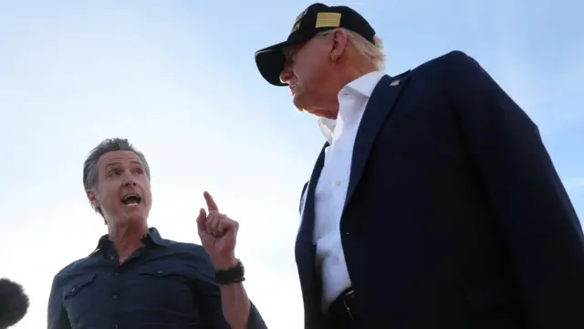 Governor of California Gavin Newsom next to U.S. President Donald Trump