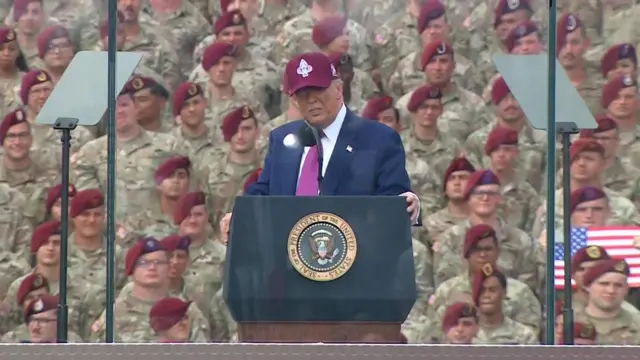 Donald Trump speaks in front of dozens of military men and women wearing red berets