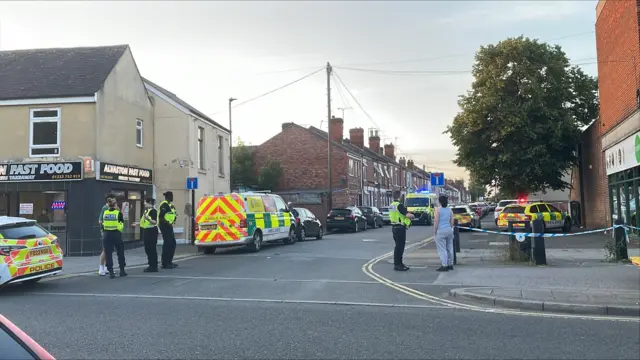 Emergency services at a cordon across Eden Street