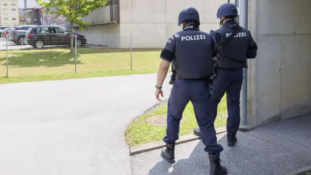 Police outside the Dreierschützengasse high school following a shooting in Graz
