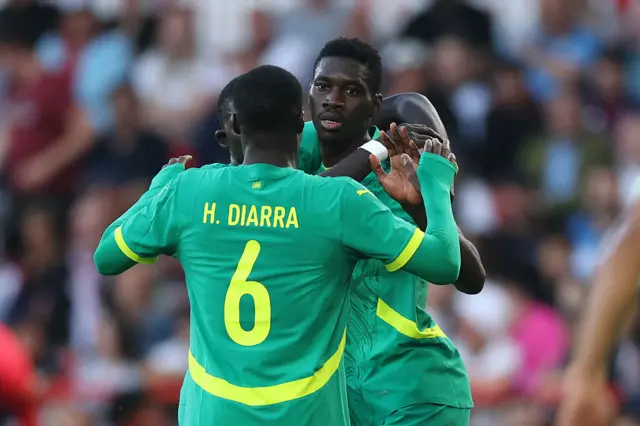 Ismaila Sarr celebrates