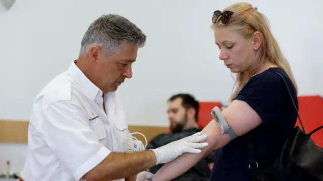 A person gives blood in Graz