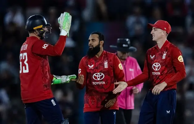 Adil Rashid celebrates a wicket