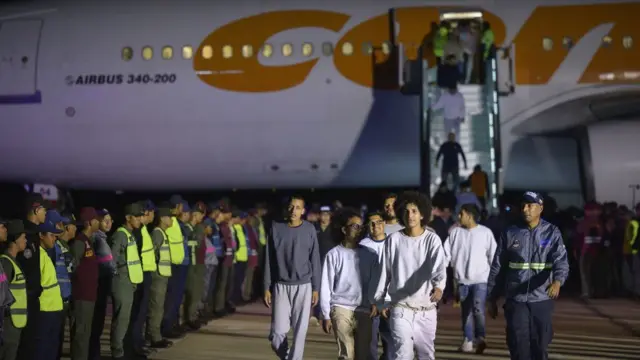 Deported individuals from the US arrive on a flight at Simon Bolivar International Airport in Venezuela in March 2025.