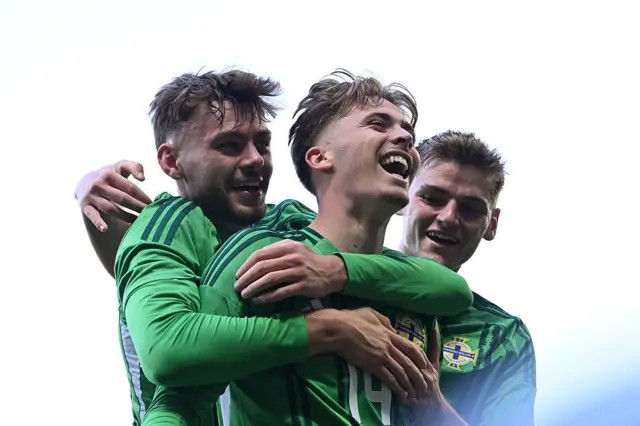 Isaac Price celebrating with teammates