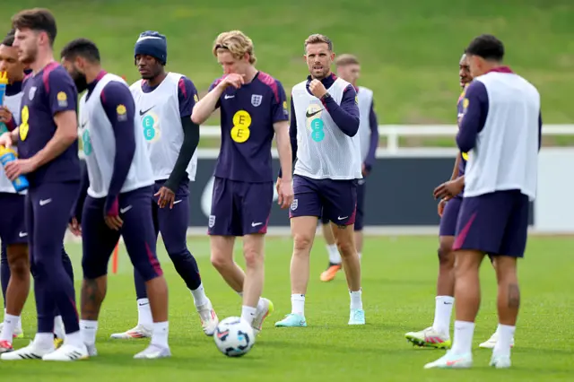 Jordan Henderson training with teammates