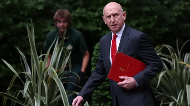 John Healey arrives for a cabinet meeting at Downing Street