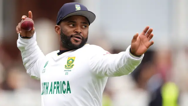 Temba Bavuma throws the ball