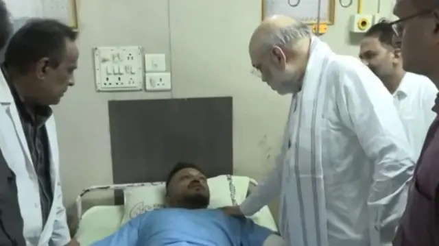 Amit Shah (right) meeting Vishwashkumar Ramesh