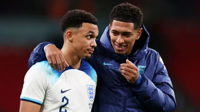 Trent Alexander-Arnold and Jude Bellingham of England celebrate a