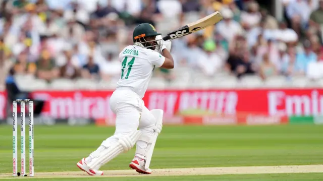 Temba Bavuma drives for four