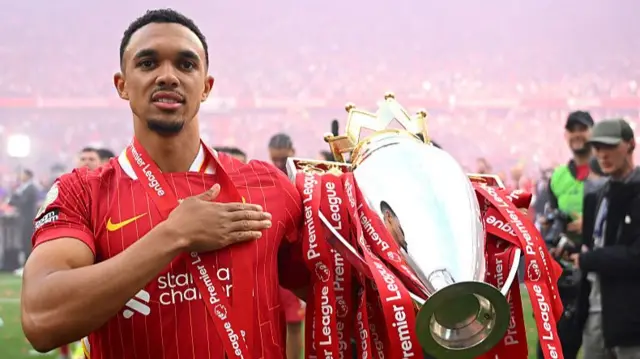 Trent Alexander-Arnold with the Premier League trophy