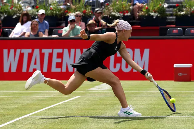 Diana Shnaider reaches for a forehand