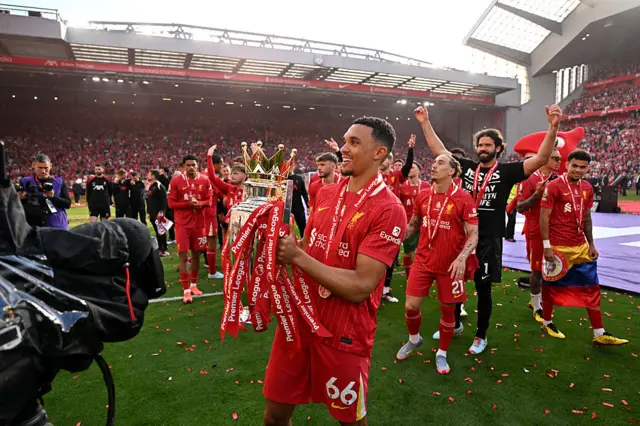 Trent Alexander-Arnold lifts Premier League trophy