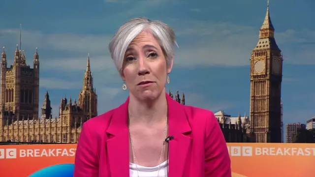 Daisy Cooper wearing a pink blazer in the BBC Breakfast studio