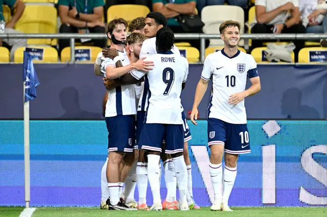 Elliott is congratulated by teammates after opening the scoring
